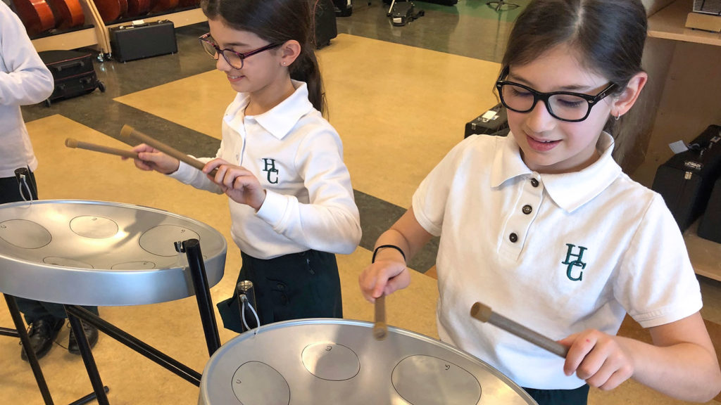 Junior School students play steel pan.