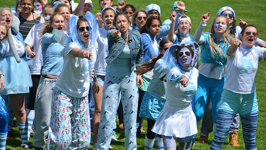 Kate Leonard House cheering at House Shout.