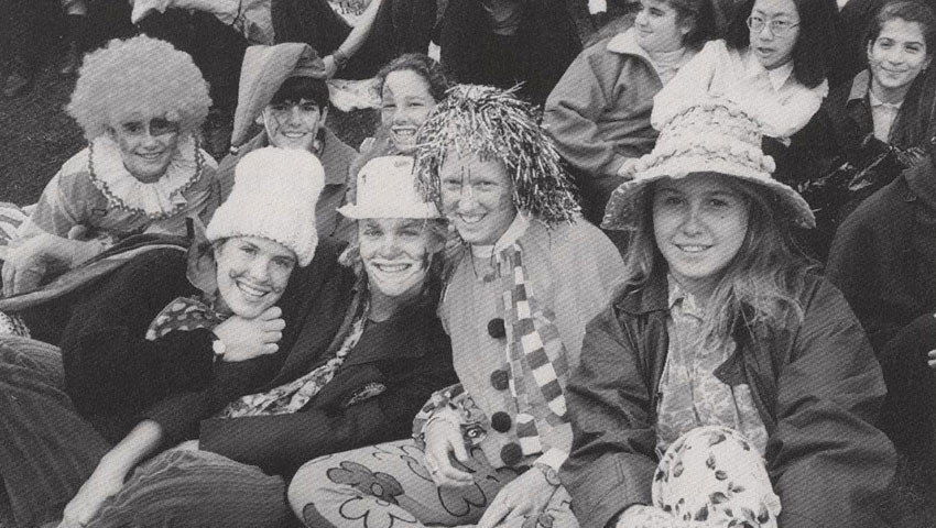 Black and white photo of students dressed in spirit wear.