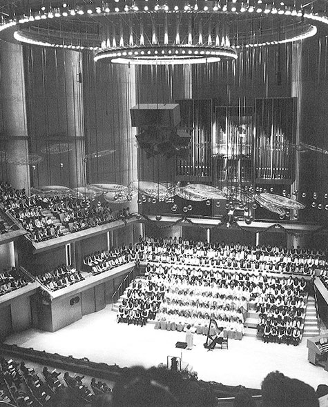 Black and white photo of a musical performance at Roy Thomson Hall.