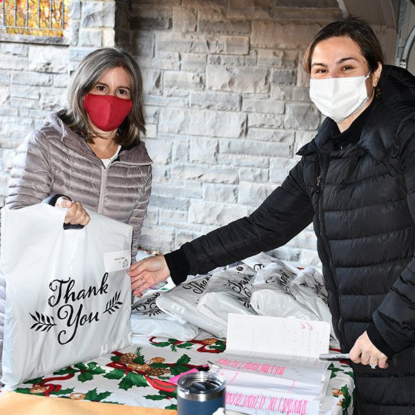 Photo of parent volunteers at the Holiday Marketplace