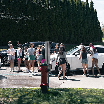 Boarders wash cars at Upper Canada College.