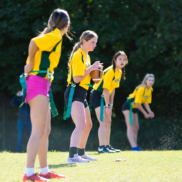 Flag football players ready to start playing.