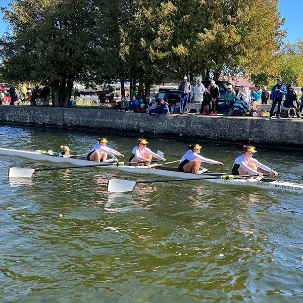 Rowing team on the lake.