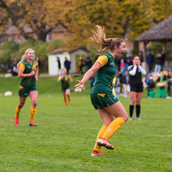 Natalie playing soccer.