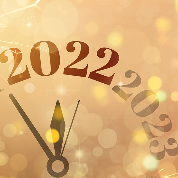 A clock turning from 2022 to 2023