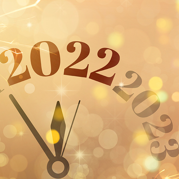 A clock turning from 2022 to 2023