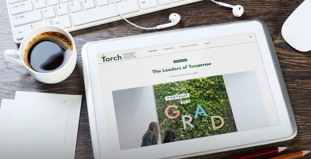 The Torch magazine website displayed on a tablet.