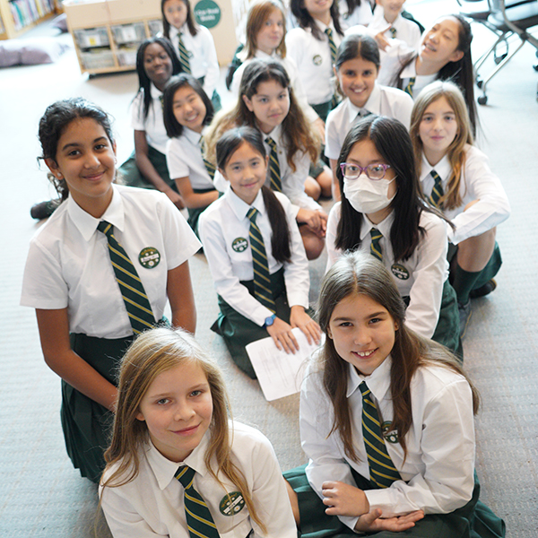 Grade 6 students in a group.