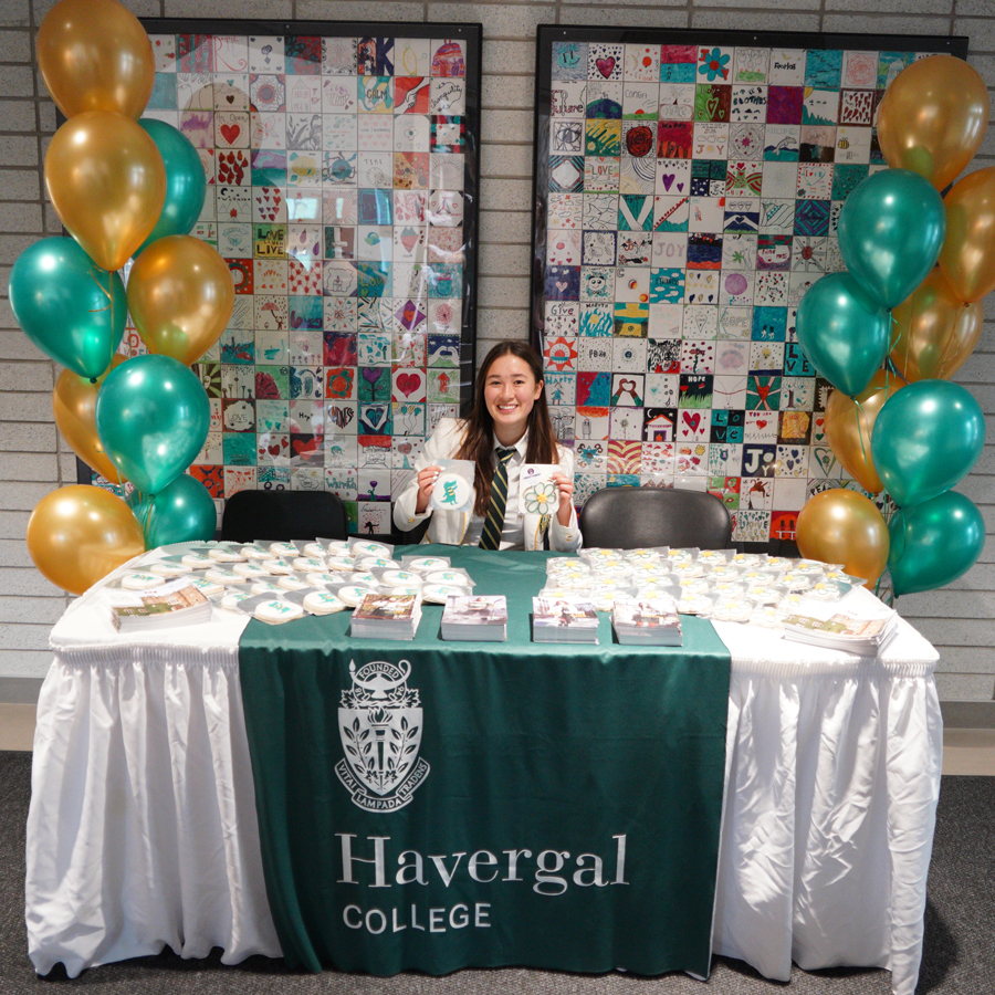 Student at an Open House booth.