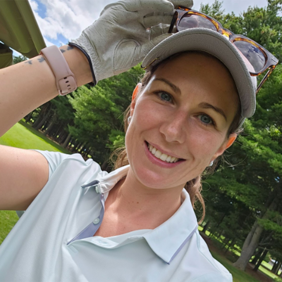 Mme Hogan wearing golf gear.