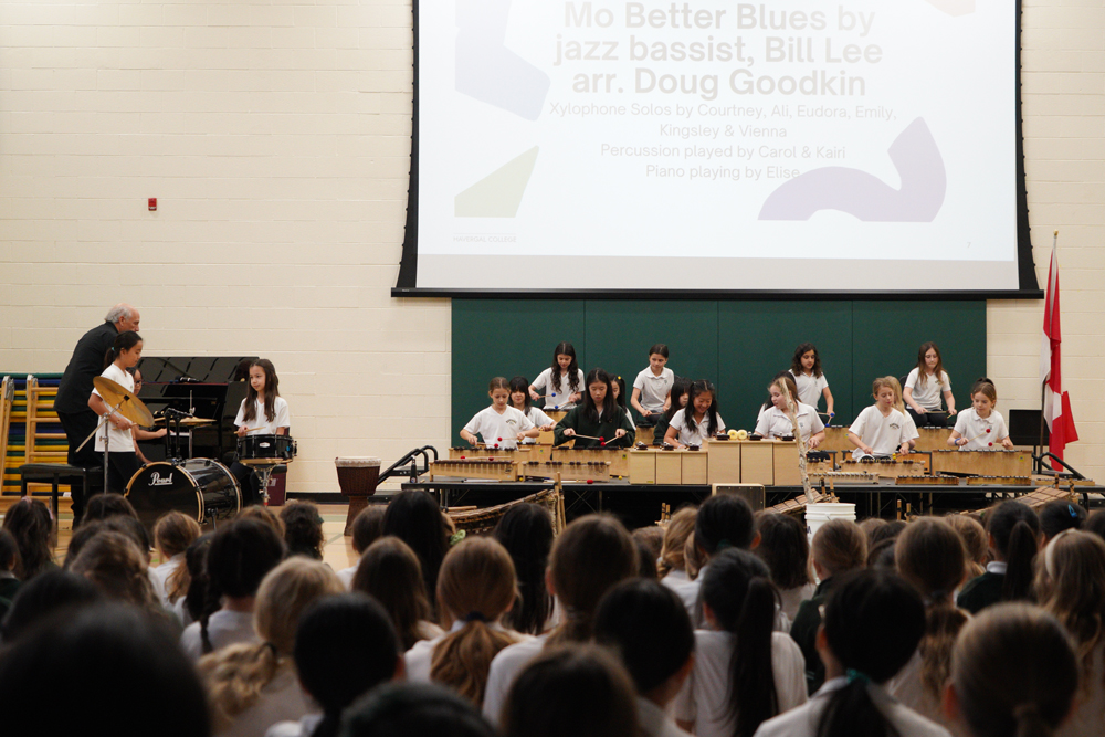 Students performing on Orff instruments.