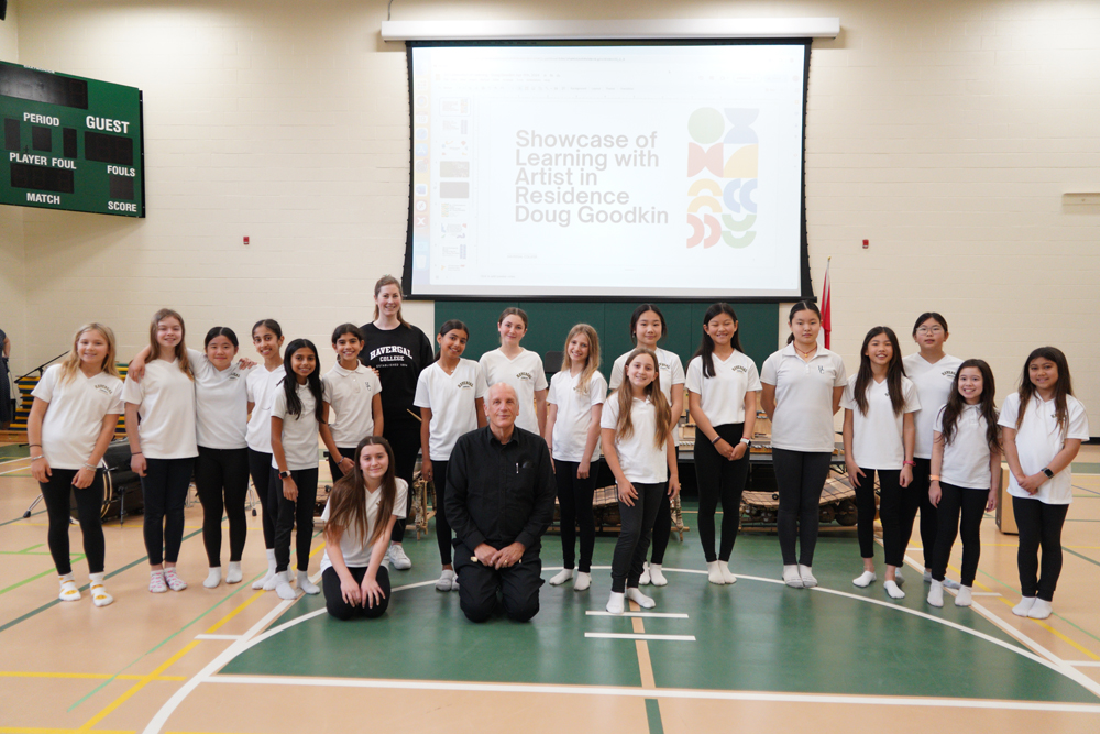 Doug Goodkin with Grade 6 student performers.