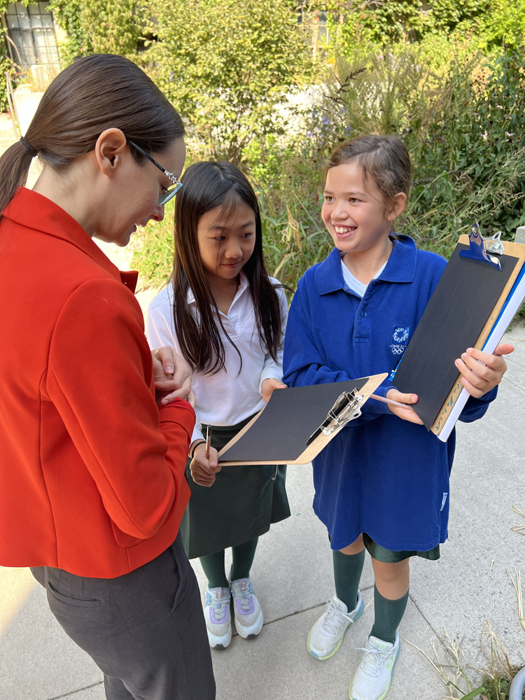 Indigenous educator Marissa Magneson works with Grade 6 students.