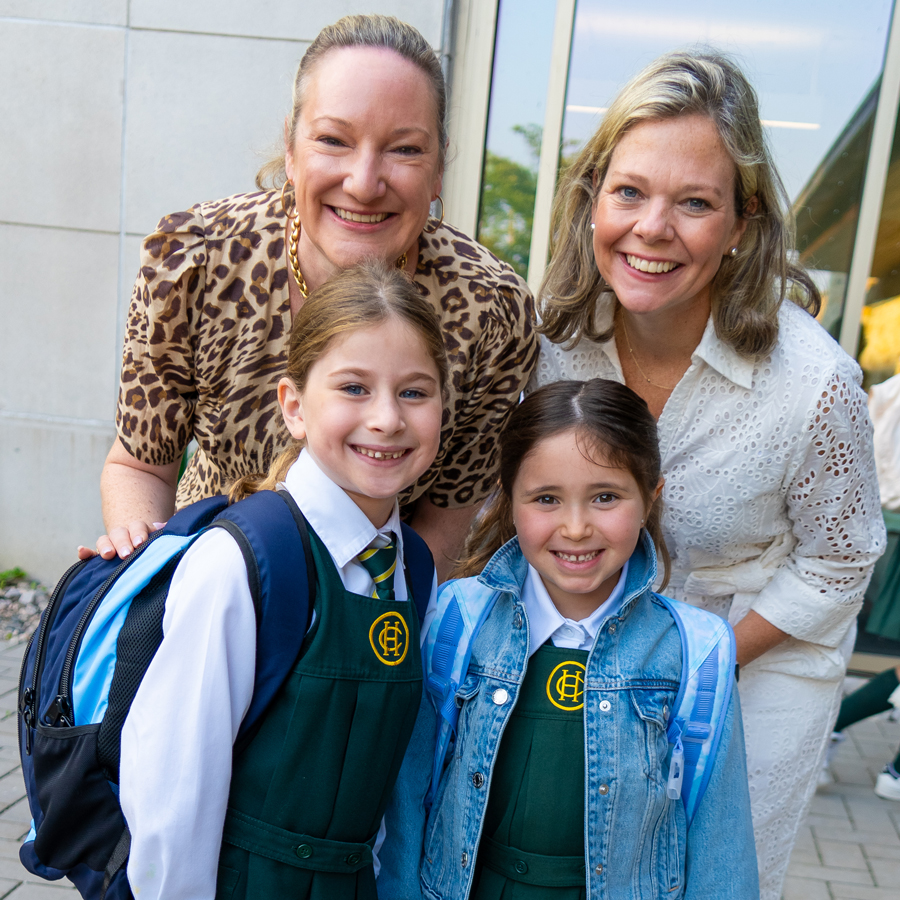 Kate White and Liz Watt with two Junior School students.