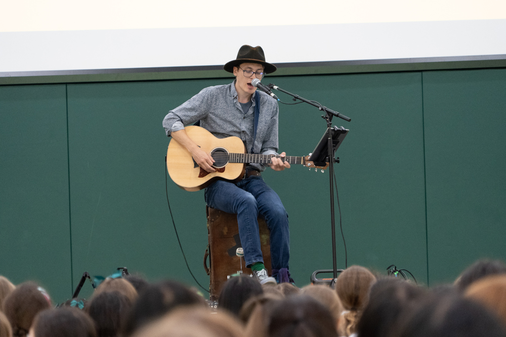 Matthew Magneson singing at Junior School Prayers.