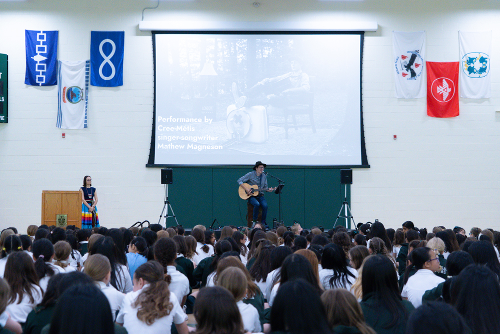 Matthew Magneson singing at Junior School Prayers.