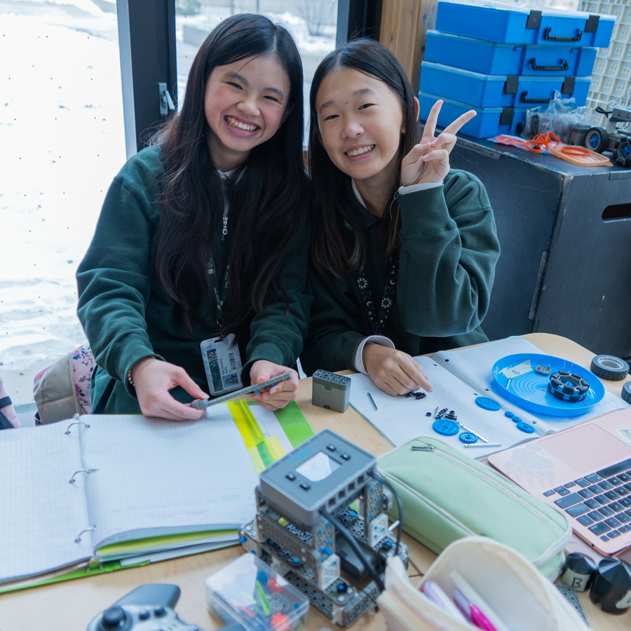 Grade 8 students working on Robotics projects.