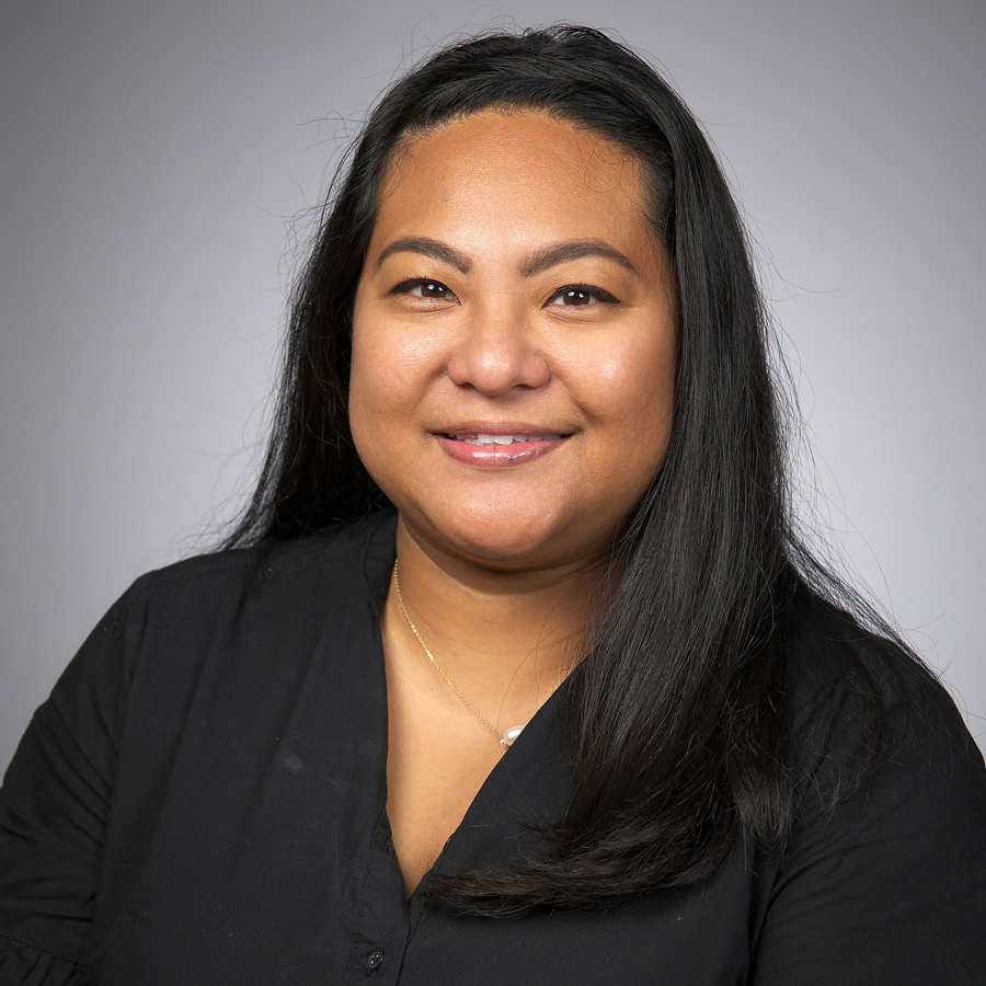 Headshot of L. Santiago.