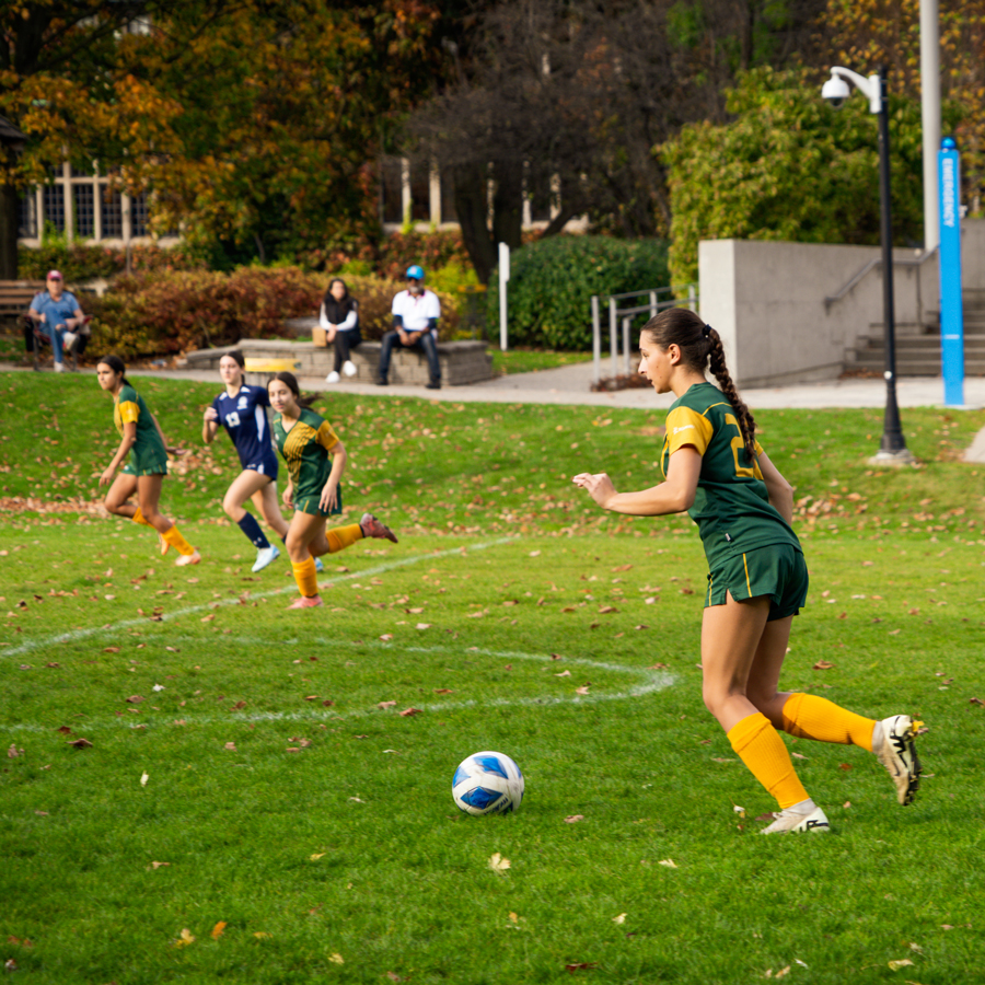 students playing soccer