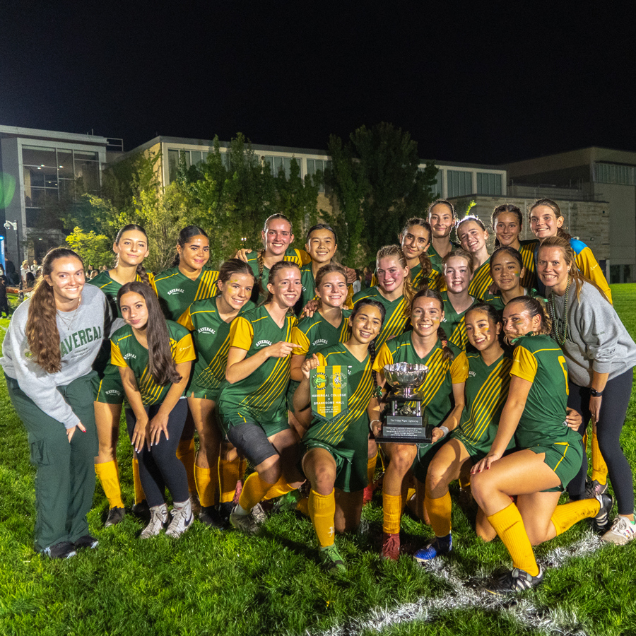 U20 Soccer Team holding the FNL Cup after winning the game.