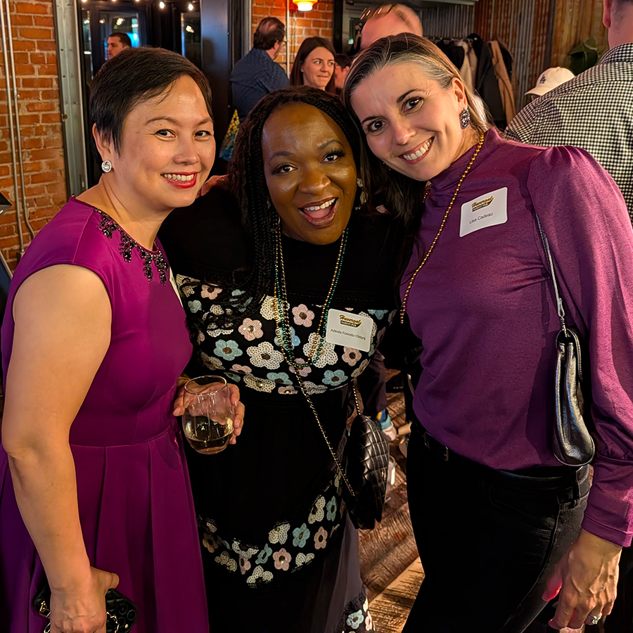 Parents posing for a photo at the Parent Pub.