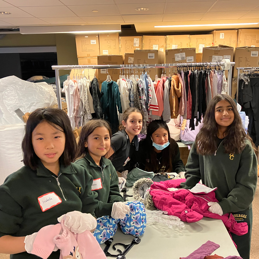 Grade 5 students volunteering at New Circles.