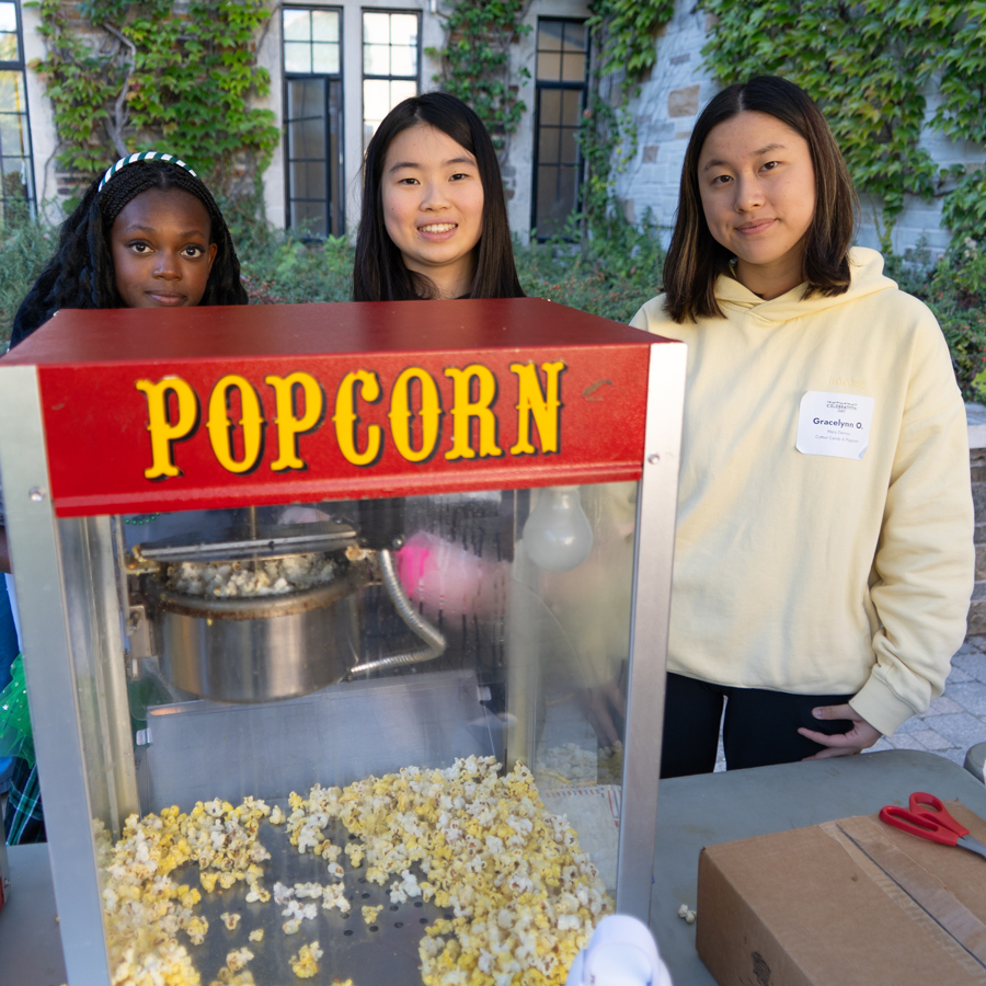 Boarding students host the popcorn stand at Celebration Day.